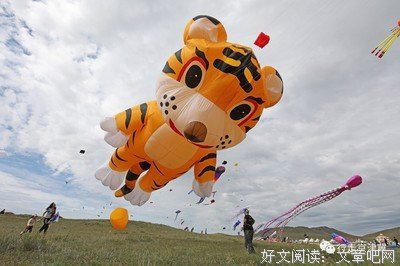 春天，一定要让风筝放你