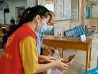 “红鹰”社会实践小组参与接种疫苗志愿活动