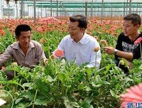 挺起新时代中国精神的脊梁